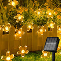Guirnalda de luces solares de flores 50 led y 7 metros